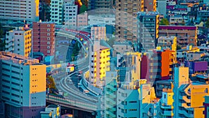 A time lapse of highway at the urban city in Tokyo long shot zoom
