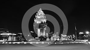 Time-lapse, Independence Monument. Nighttime traffic with motion blur black and white