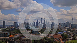 Time lapse Kuala Lumpur city and dancing clouds background