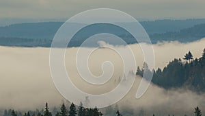 Time lapse of low clouds and fog over Happy Valley OR landscape 4k UHD video USA