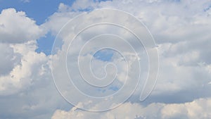 Time Lapse, motion white, gray, puffy clouds