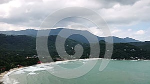 Time lapse Mountains, clouds, beach and waves