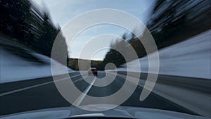 Time lapse of the movement on the car on the road through national park Harz in the winter. Lower Saxony. Germany.