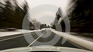 Time lapse of the movement on the car on the road through national park Harz in the winter. Lower Saxony. Germany.