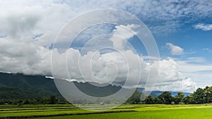 Time lapse  movement of sky cloudy over the mountain green field of local rice terrace