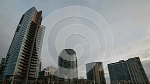 Time Lapse Movie of Fast Moving Gray Clouds Over Downtown Highrise Condominiums in Portland Oregon on a Stormy Winter Day 1080p