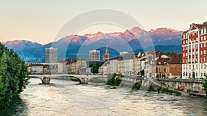 Time lapse over Isere river with mountain background in Grenoble, France