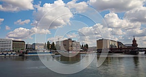 Time lapse over the river Spree over the skyline of Berlin, capitol of Germany