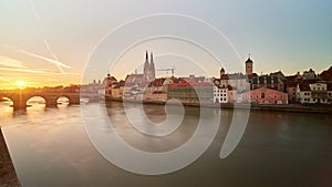 Time lapse panorama of Regensburg from side of Danube river, Bavaria, Germany