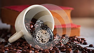 Time lapse pocket watch and coffee cup on coffee seed and old book on wooden table.