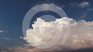 Time-lapse puffy and fluffy clouds on the blue sky.