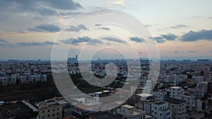 Time lapse of a residential area in a Chinese suburb in sunset time