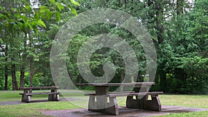 Time lapse setting shot of a picnic table in a park on a summer day in Vancouver, Canada, North America. Daytime