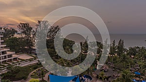 Time lapse of skyline during sunset at a beach front resort