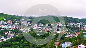 Time lapse small town on a stormy morning