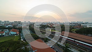 Time lapse of sun rising over public transportation in Eunos Singapore early morning
