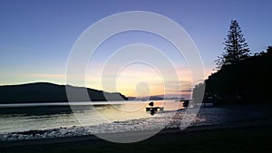 Time lapse of sunrise over Sandspit beach New Zealand