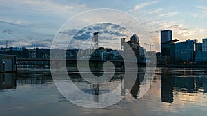 Time lapse of sunset and clouds over Portland Or and Hawthorne bridge with water reflection into night 4k uhd
