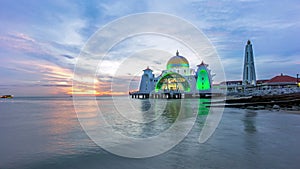 Time lapse. sunset at Floating Mosque, Straits of Malacca. Zoom out