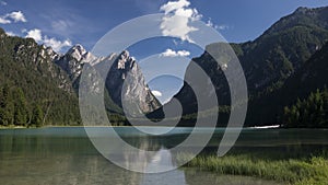 Time lapse of Toblacher Lake in the Dolomite Alps during sunny day, South Tyrol Italy