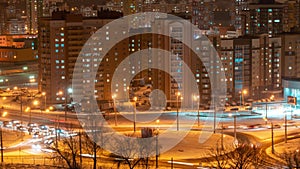 Time lapse urban junction overpass at night rush hour traffic city panorama