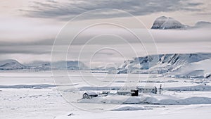 Time lapse Vernadsky antarctic station at white snow, ice landscape on island. Antarctica expedition
