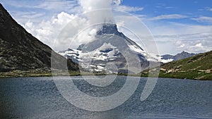 Time lapse view on Matterhorn peak and lake Stellisee, Zermatt, Switzerland