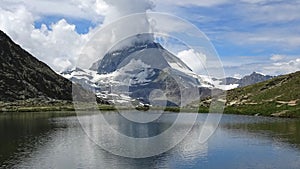 Time lapse view on Matterhorn peak and lake Stellisee, Zermatt, Switzerland