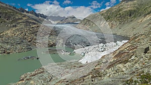 Time lapse, view of melting glacier in the Swiss Alps. Rhone Glacier, the source of the river Rhone. Furka Pass, Canton Valais,