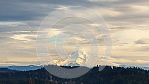 Time lapse of white clouds and blue sky over snow covered mount Hood in Portland Oregon 4k