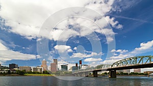 Time lapse of white clouds over downtown Portland Oregon with Hawthorne bridge 4k uhd