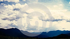 Time lapse of wickedly intense clouds roiling and flowing over peaks