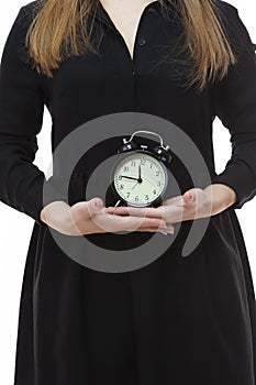 Time Manageent Ideas. Closeup of Female Hands With Clock. Posing Against White