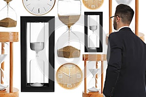 Time management concept. Businessman standing in front of different hourglasses on white background