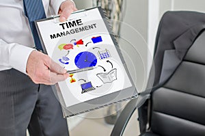 Time management concept on a clipboard