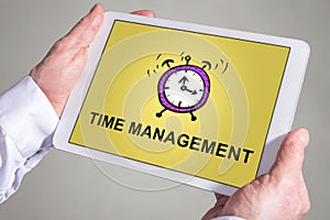 Time management concept on a tablet