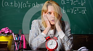 Time management. teacher with alarm clock at blackboard. Time. Study and education. Modern school. Knowledge day. School