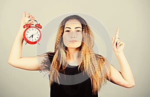 Time management. Woman hold vintage alarm clock. Watch repair. Punctuality and discipline. Practice of advancing clocks