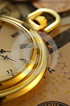 Time and Money. Clock in US dollars - Stock Image