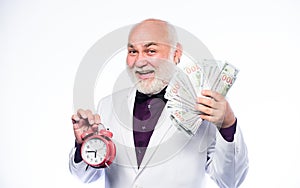 Time is money. time management. business success. retirement. Timekeeping. mature bearded man with alarm clock. mature