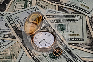 Time is money watch with cash background.