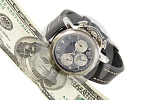 Time is money. Watch and hundred dollars