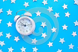 Time for party and wake up to work, white alarm clock with party decoration