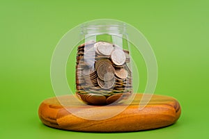 time, savings, coins in a glass jar, financial planning financial investment Income, cash flow and living expenses