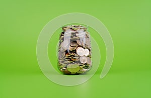 time, savings, coins in a glass jar, financial planning financial investment Income, cash flow and living expenses