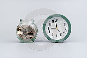 time, savings, coins in a glass jar, financial planning financial investment Income, cash flow and living expenses