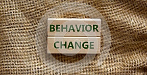 Time to behavior change symbol. Wooden blocks with words `behavior change`. Beautiful canvas background. Copy space. Business,