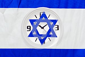 Time to decide making decisions isolated clock with Israeli flag. Israel Daylight Saving Time Started Or Ended.