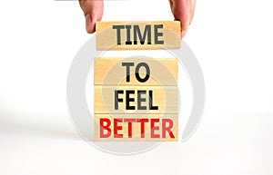 Time to feel better symbol. Concept words Time to feel better on wooden block. Beautiful white table white background. Businessman
