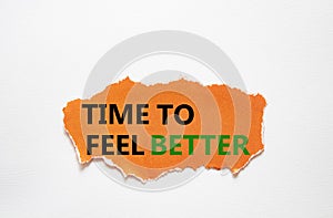 Time to feel better symbol. Torn orange paper with words Time to feel better. Beautiful white background. Medicine and Time to